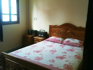 chambre à lit double avec belle vue sur mer